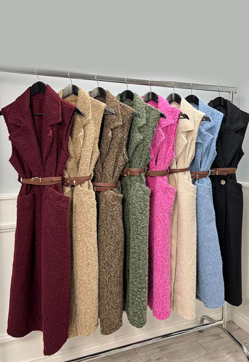 Autumn sleeveless teddy jacket with a double-breasted front adorned with gold-tone buttons
