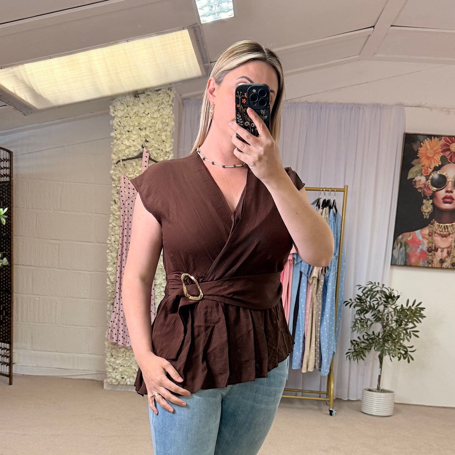Wrap tops with gold buckle detail