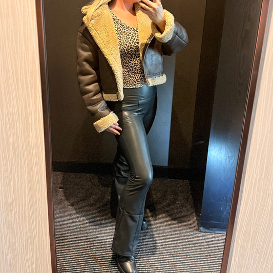 Black wet look flare trousers