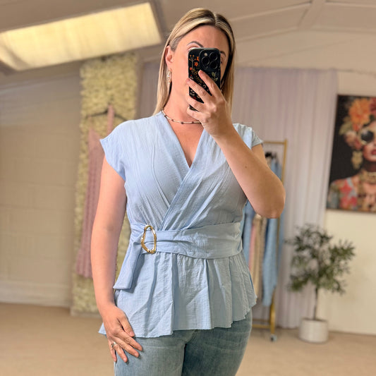 Wrap tops with gold buckle detail
