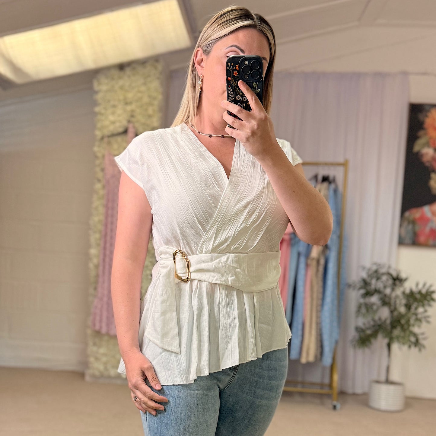 Wrap tops with gold buckle detail