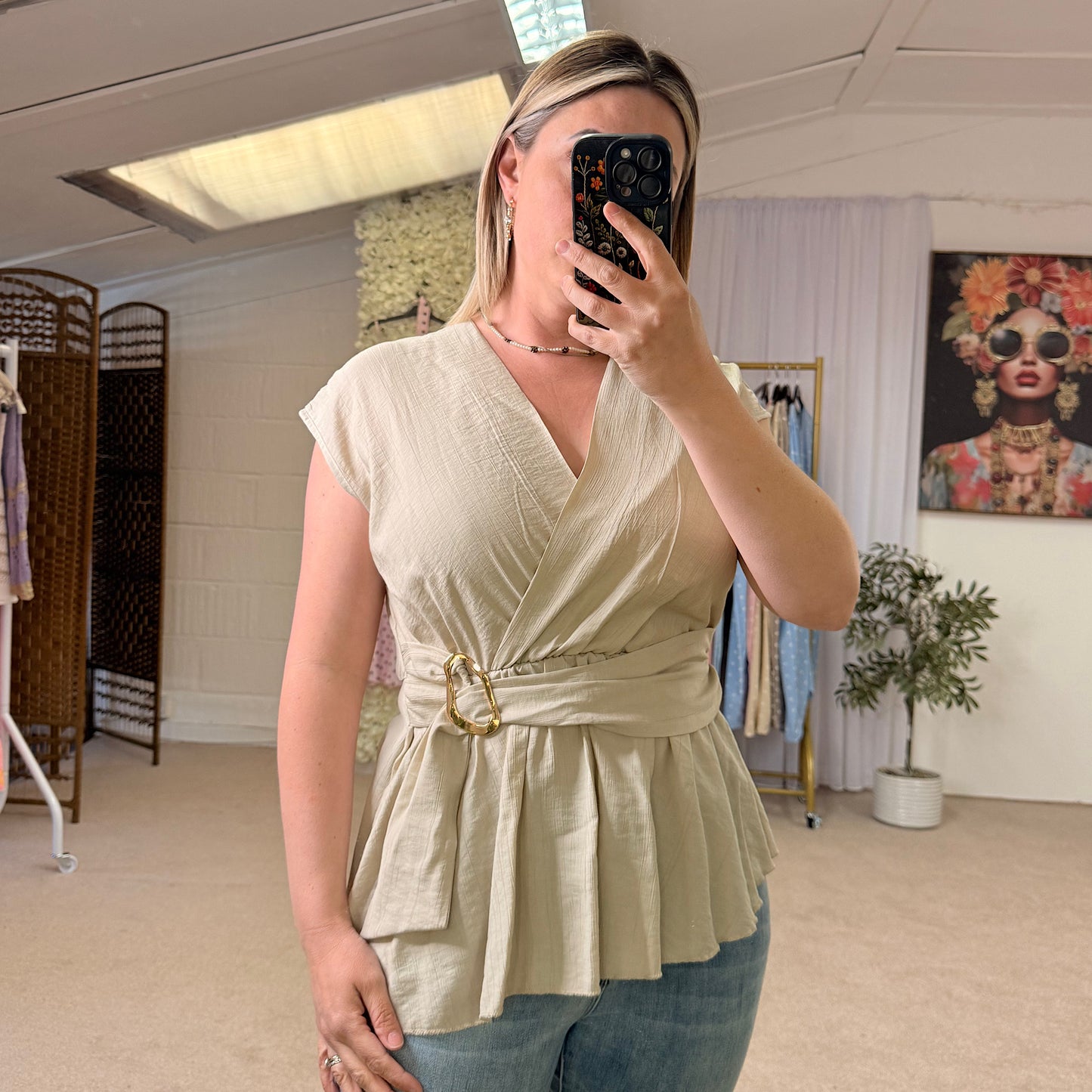 Wrap tops with gold buckle detail